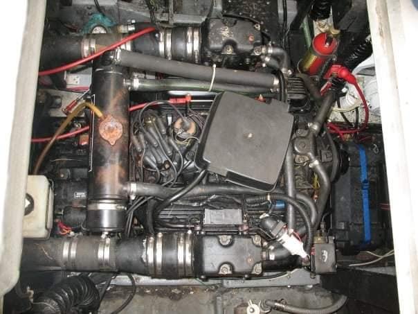 Jamie fixing boat engine - DIY boat repair for beginners
